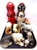 A tray of two Dutch Jerna pottery dog ornaments and further ceramic dog figures.