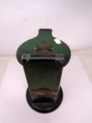 An antique cast iron and enamelled ticket stamping machine by Waterlow & Sons Ltd, London.