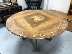 An inlaid circular dining table