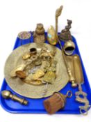 A tray containing antique and later brass ware including Indian brass plates, bottle openers,