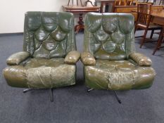 A pair of 1970's century Tetrad Nucleus armchairs upholstered in green leather on chrome swivel