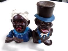 Two cast iron novelty money boxes.