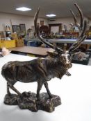 A cast iron figure of a Stag, approximately 43 cm x 36 cm.