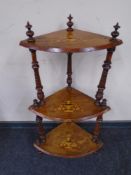 A Victorian inlaid rosewood three tier corner whatnot stand.