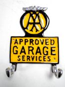 An aluminium AA approved garage services two-hook coat rack.