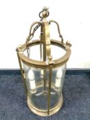 A Victorian style brass and glass cylindrical pendant light fitting (height 66cm).