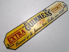 A cast iron wall plaque, Guinness Extra Stout.