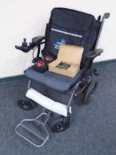 An eFoldi Powerchair, with charger,