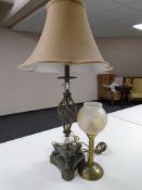 A brass table lamp with shade together with a further contemporary Art Deco style table lamp with