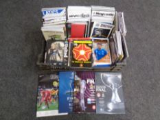 A box containing a large quantity of assorted football and rugby programs including Newcastle