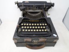 A vintage Corona typewriter in case.