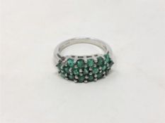 A sterling silver South African emerald cluster ring, size M/N.