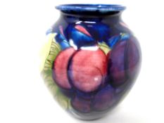 A Moorcroft Wisteria vase (height 10cm).