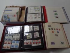 Four albums and a box containing world stamps and first day covers including aviation, wildlife,