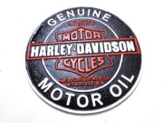 A cast iron wall plaque, Harley-Davidson.