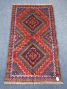 A Baluchi rug 147 cm x 84 cm