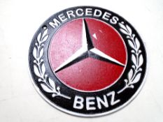 A cast iron wall plaque, Mercedes-Benz.