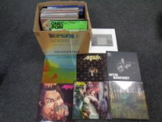 A box containing Vinyl LPs including The Beatles, Motorhead, Anthrax, The Undertones, Thin Lizzy,