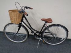 A Claud Butler Windsor lady's bike with shopping basket and leather saddle.