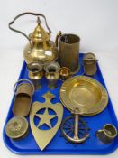 A tray containing antique and later brass ware including miniature coal helmets, ashtrays,