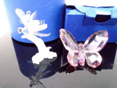 A Swarovski crystal ornament, dragonfly together with a further Swarovski crystal ornament,