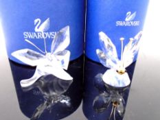 Two Swarovski crystal ornaments, butterflies.