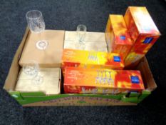 A box containing boxed glassware including French crystal glasses, Royal Brierley glasses etc.