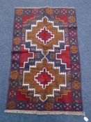 A Baluchi rug 136 cm x 86 cm
