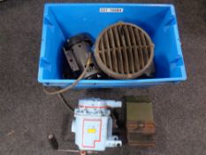 A crate containing a vintage speaker, periscope, field radio generator etc.