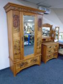 An Edwardian satinwood mirror door wardrobe with fitted drawer together with a three drawer