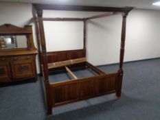 A Victorian style four poster bed (internal width 158cm).