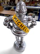 An aluminium figure, Michelin man.