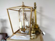 A contemporary gilt metal brass lantern light fitting together with two brass table lamps.