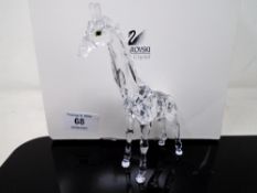 A Swarovski Silver Crystal ornament, giraffe.