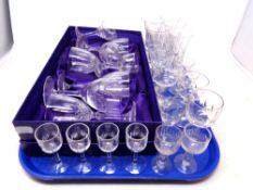 A tray containing assorted glassware including antique liqueur glasses,