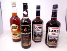 Four bottles of rum including two Lamb's Navy Rum (1 Litre) bottles,