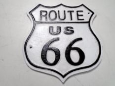 A cast iron wall plaque, Route 66.