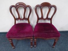 A pair of Victorian mahogany dining chairs.