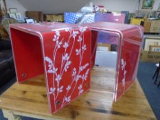 A pair of contemporary perspex occasional tables.