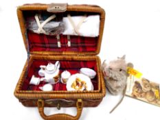 A Merrythought porcelain child's tea service in wicker basket together with a Steiff soft toy mouse,