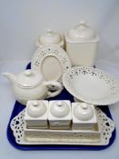 A tray containing Casa Domani Chantilly cream ware ceramics.