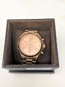 A gent's Michael Kors rose gold-plated quartz wristwatch, case 44mm, boxed.