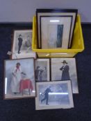A crate containing monochrome photographs including figures in 1930s dress,
