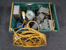 A crate containing a 110v extension cable, vintage switch boxes etc.