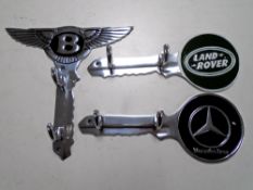 Three aluminium key racks, Bentley, Mercedes-Benz and Land Rover.