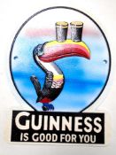 A cast iron wall plaque, Guinness Toucan.
