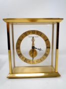 A brass cased Jaeger-LeCoultre desk clock with eight day inline movement, height 17cm,