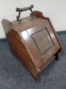 A 19th century mahogany coal receiver with liner.