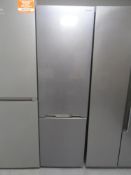 A Sharp upright fridge freezer (stainless steel).