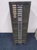 A metal 30-drawer index chest containing hardware, brass plates, fittings etc.